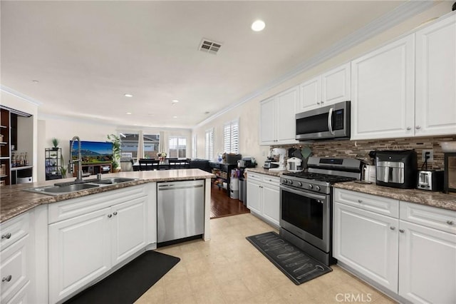 5384 Palestrina Way, Fontana, CA 92336 - kitchen with a sink, white cabinetry, visible vents, and stainless steel appliances
