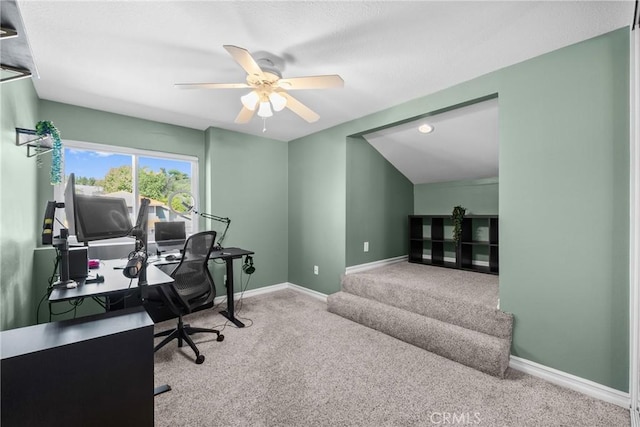office featuring baseboards, carpet, and ceiling fan