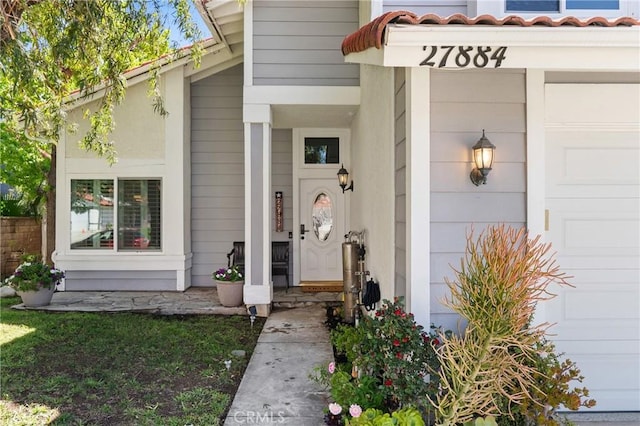 27884 Beacon St, Castaic, CA 91384 - view of exterior entry with a garage