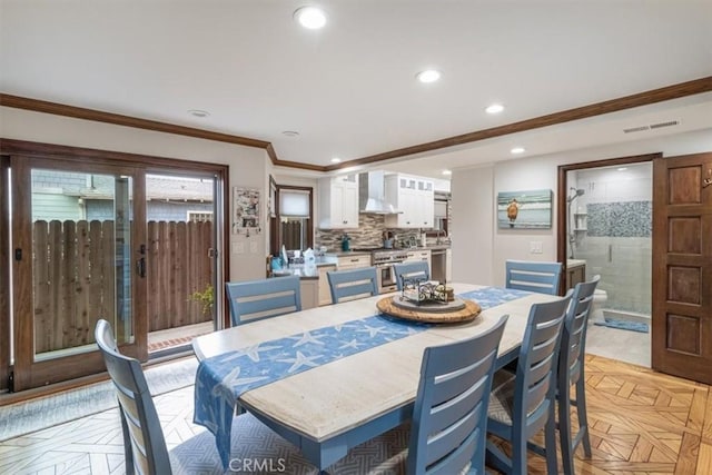 57 B Surfside Ave, Surfside, CA 90743 - dining room featuring recessed lighting, visible vents, and crown molding