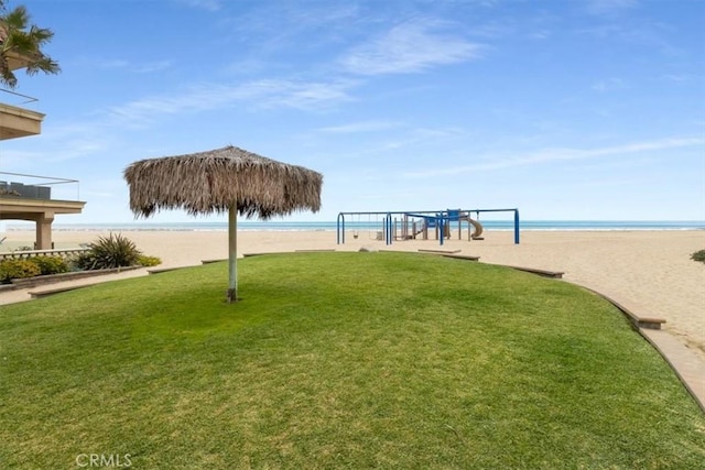 57 B Surfside Ave, Surfside, CA 90743 - view of property's community with a water view, playground community, and a lawn