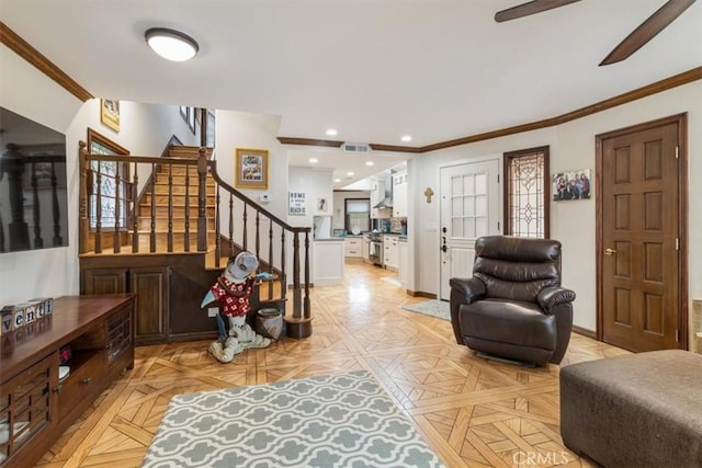 57 B Surfside Ave, Surfside, CA 90743 - living area with crown molding, ceiling fan, recessed lighting, stairway, and baseboards