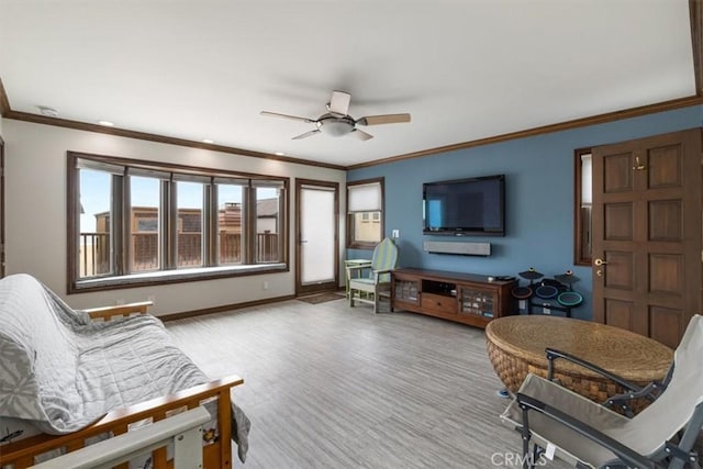 57 B Surfside Ave, Surfside, CA 90743 - living room with baseboards, a ceiling fan, ornamental molding, and a healthy amount of sunlight