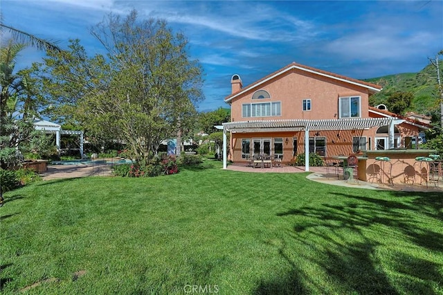 17816 Tuscan Dr, Granada Hills, CA 91344 - rear view of property with a pergola, a swimming pool, a patio, and a chimney