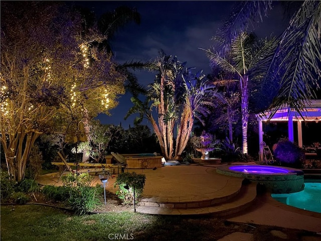 17816 Tuscan Dr, Granada Hills, CA 91344 - yard at twilight with a pool with connected hot tub