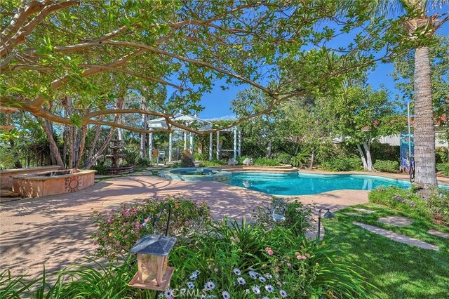 17816 Tuscan Dr, Granada Hills, CA 91344 - view of pool featuring a pool with connected hot tub