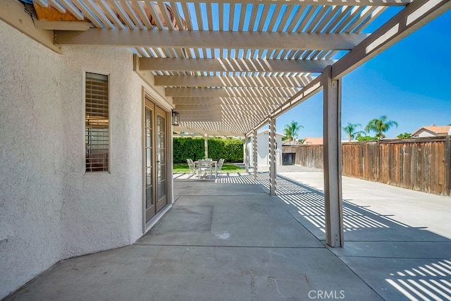 view of patio featuring a fenced backyard and a pergola