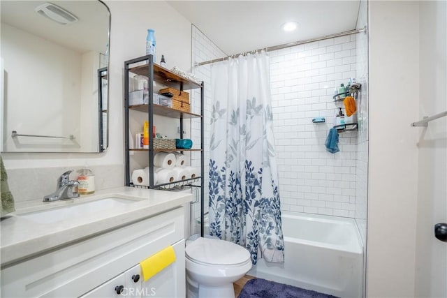 full bathroom featuring toilet, visible vents, shower / bath combo with shower curtain, and vanity