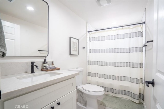 bathroom with toilet, recessed lighting, vanity, and a shower with curtain