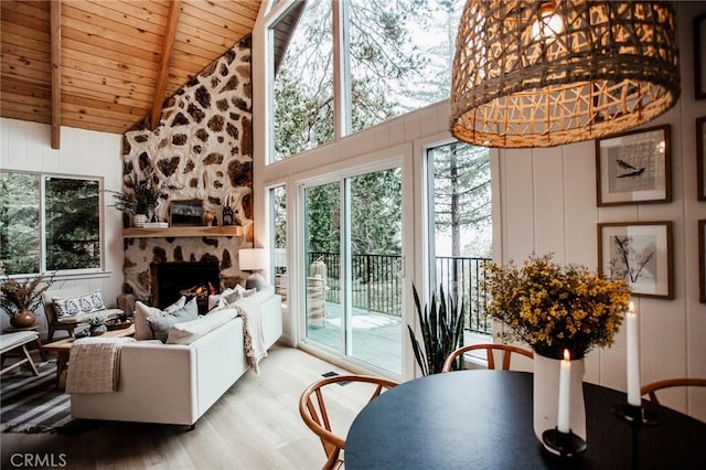 sunroom featuring beam ceiling