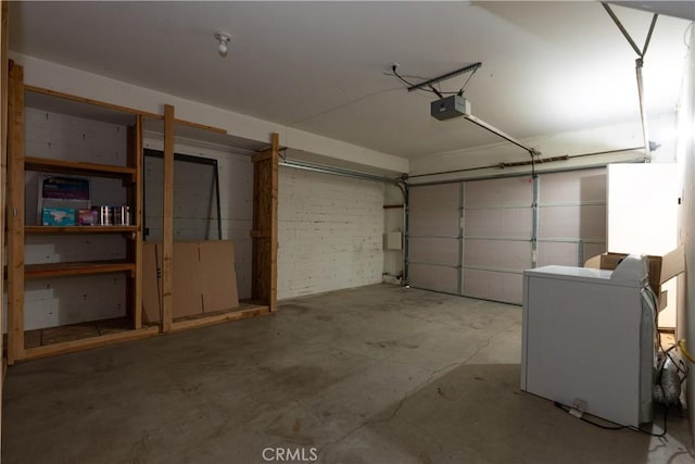 862 Strawberry Peak Rd, Twin Peaks, CA 92391 - garage with a garage door opener and washer / clothes dryer