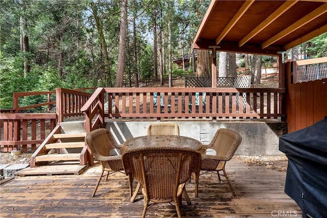 862 Strawberry Peak Rd, Twin Peaks, CA 92391 - wooden deck with grilling area and outdoor dining space