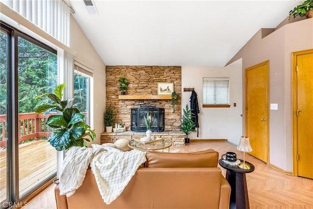 862 Strawberry Peak Rd, Twin Peaks, CA 92391 - living room with visible vents, baseboards, vaulted ceiling, and a fireplace