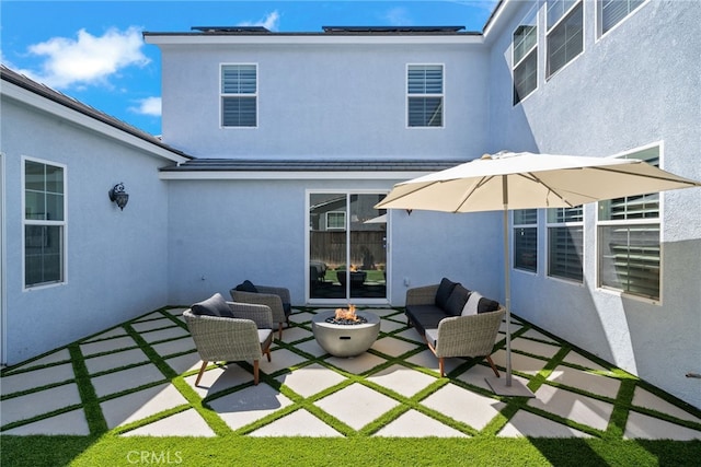17245 Eagle Canyon Pl, San Diego, CA 92127 - back of property with a patio, stucco siding, and an outdoor living space with a fire pit