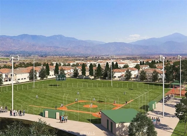 1065 Lumia Cir, Redlands, CA 92374 - view of property's community featuring a lawn, fence, a mountain view, and a residential view