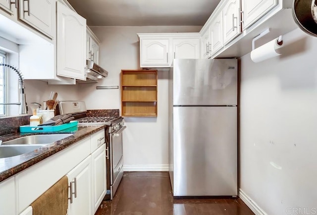 kitchen with white cabinets, stainless steel appliances, under cabinet range hood, and a sink