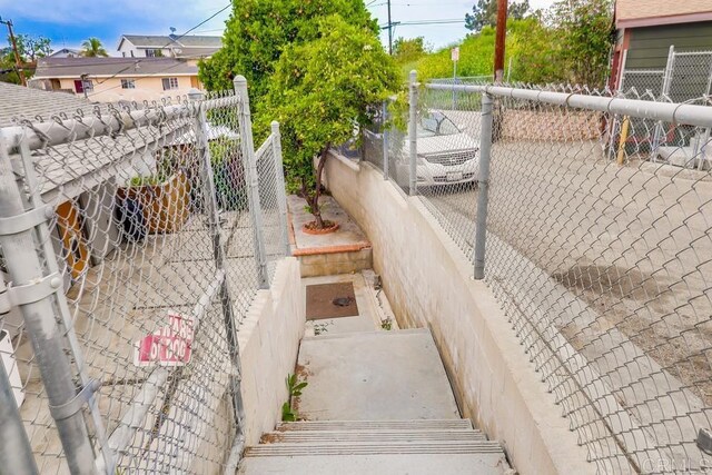 exterior space featuring fence private yard