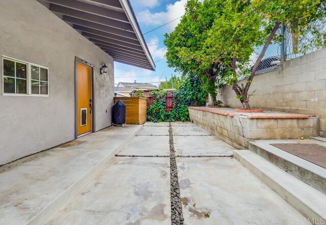 view of patio with a fenced backyard
