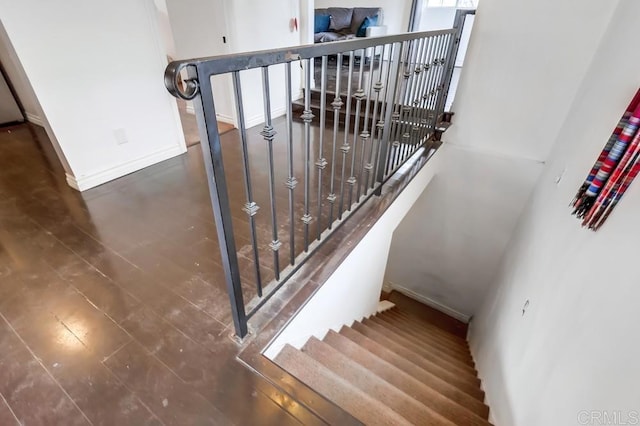 stairs featuring baseboards