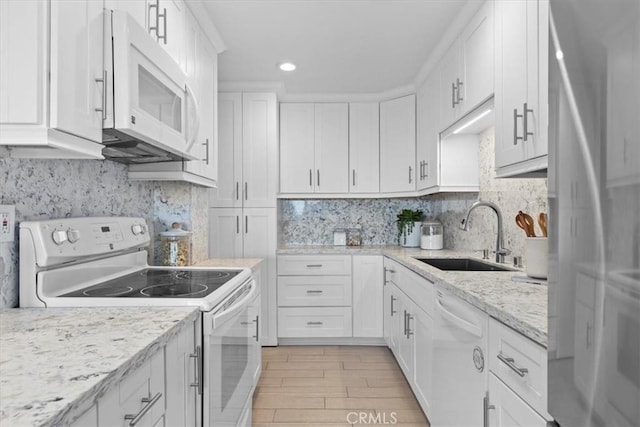 6542 Ocean Crest Dr Unit D308, Rancho Palos Verdes, CA 90275 - kitchen featuring white appliances, a sink, white cabinets, light wood-style floors, and recessed lighting