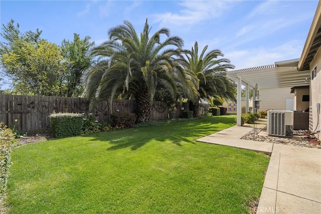 2327 Via Calle Ct, Durham, CA 95938 - view of yard featuring a pergola, a patio area, central AC, and fence