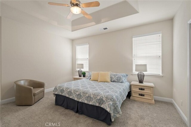 2327 Via Calle Ct, Durham, CA 95938 - bedroom featuring visible vents, baseboards, a raised ceiling, and carpet flooring