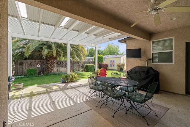 2327 Via Calle Ct, Durham, CA 95938 - view of patio with fence, a grill, outdoor dining space, and a ceiling fan