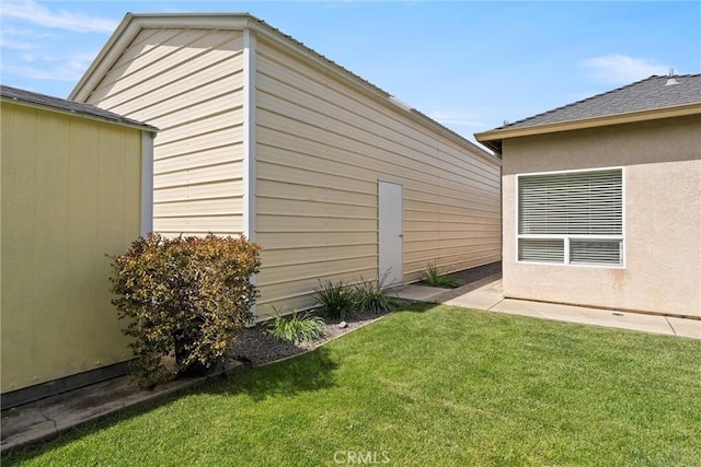 2327 Via Calle Ct, Durham, CA 95938 - view of home's exterior with a yard and stucco siding