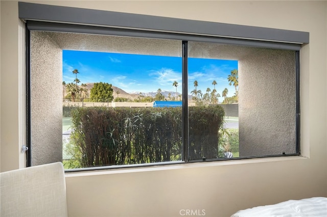 unfurnished bedroom with a mountain view