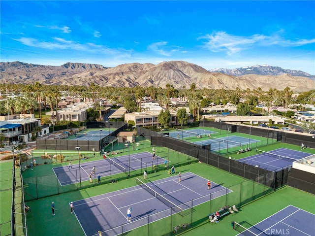 birds eye view of property featuring a mountain view and a residential view
