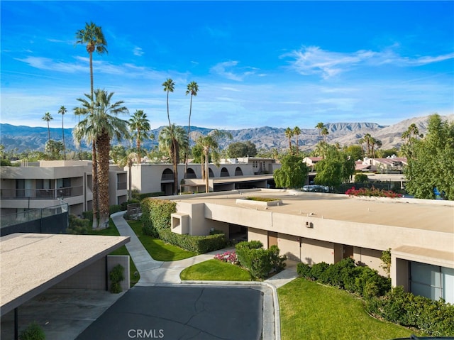 view of home's community featuring a residential view and a mountain view