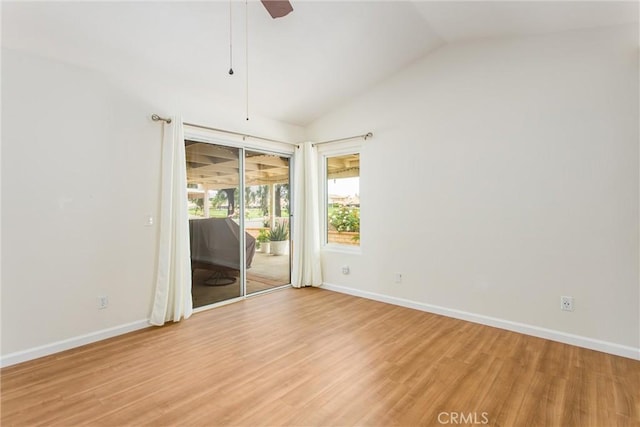 883 Riviera Ave, Banning, CA 92220 - unfurnished room with vaulted ceiling, baseboards, light wood finished floors, and a ceiling fan