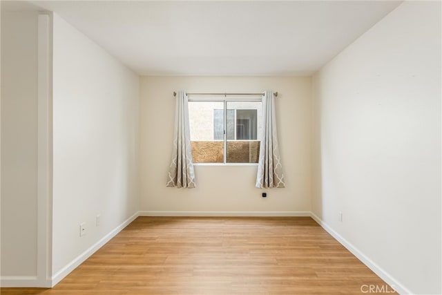 883 Riviera Ave, Banning, CA 92220 - unfurnished room featuring light wood-type flooring and baseboards