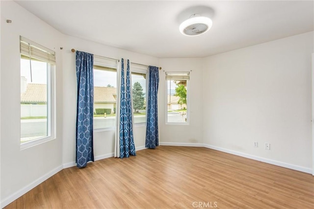 883 Riviera Ave, Banning, CA 92220 - unfurnished room with light wood-type flooring and baseboards