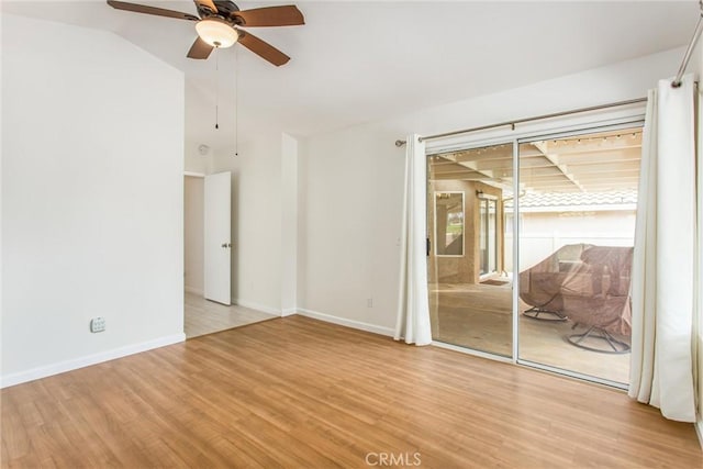 883 Riviera Ave, Banning, CA 92220 - spare room with a ceiling fan, wood finished floors, lofted ceiling, and baseboards