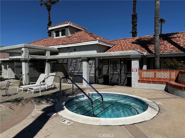 750 Diamante, San Jacinto, CA 92583 - view of swimming pool featuring a community hot tub and a patio area