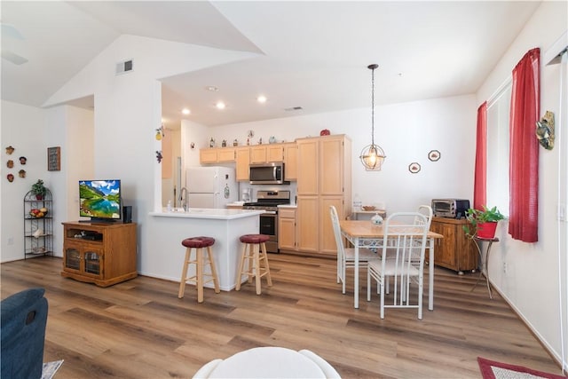 750 Diamante, San Jacinto, CA 92583 - dining space with light wood-type flooring, lofted ceiling, recessed lighting, and baseboards