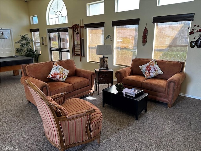 750 Diamante, San Jacinto, CA 92583 - living room with carpet, a towering ceiling, pool table, and baseboards