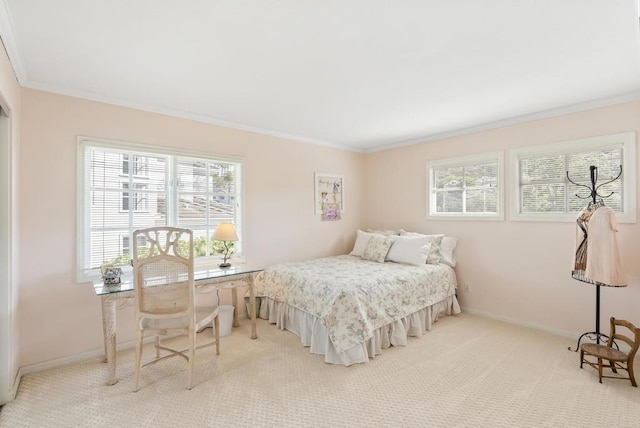 carpeted bedroom with crown molding, multiple windows, and baseboards