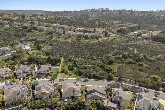 view of property location with nearby suburban area