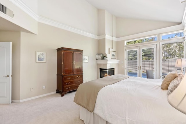 13675 Winstanley Way, San Diego, CA 92130 - bedroom featuring access to outside, high vaulted ceiling, light colored carpet, a glass covered fireplace, and baseboards