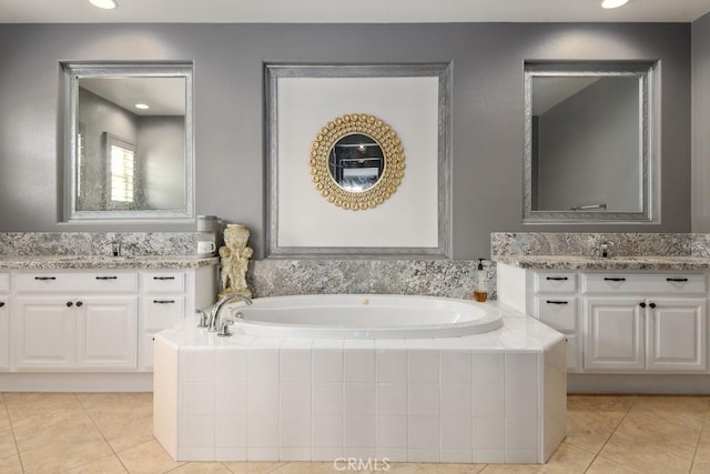 16550 Catalonia Dr, Riverside, CA 92504 - bathroom featuring tile patterned flooring, a garden tub, two vanities, and recessed lighting
