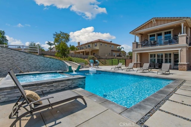 16550 Catalonia Dr, Riverside, CA 92504 - view of swimming pool featuring a patio area, fence, and a pool with connected hot tub