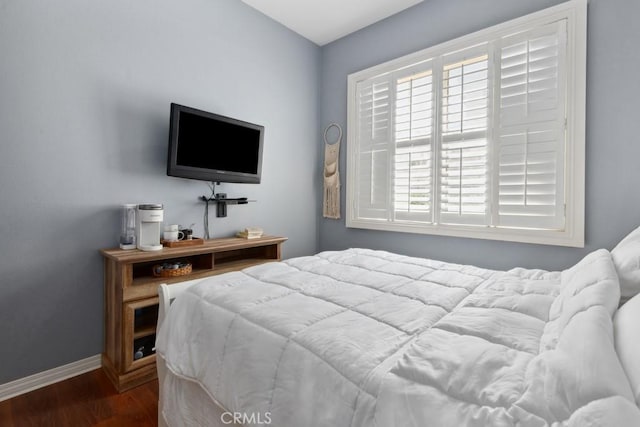 16550 Catalonia Dr, Riverside, CA 92504 - bedroom with dark wood-type flooring and baseboards