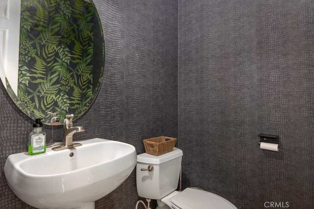 16550 Catalonia Dr, Riverside, CA 92504 - half bathroom featuring a sink and toilet