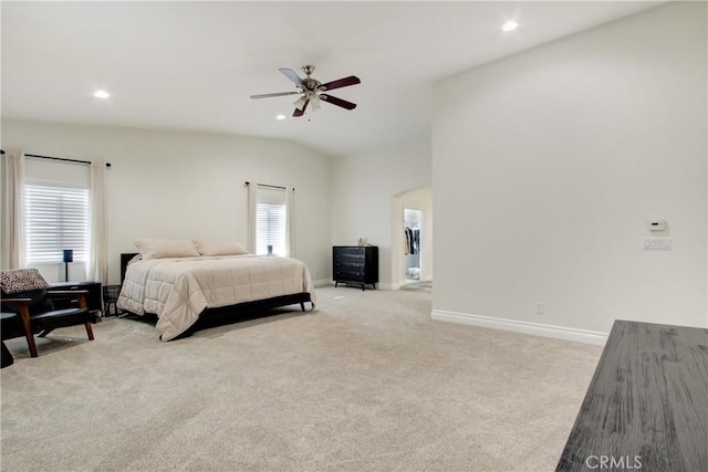 bedroom featuring recessed lighting, ceiling fan, baseboards, arched walkways, and light colored carpet