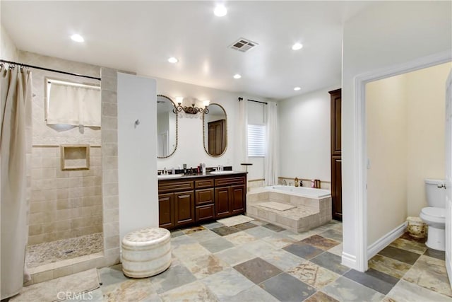 bathroom featuring a sink, a bath, visible vents, and a tile shower