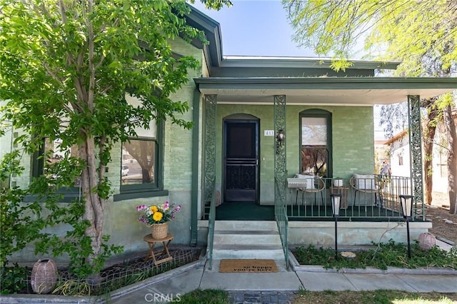 property entrance with a porch
