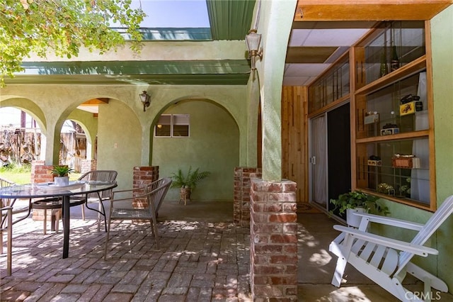 view of patio featuring outdoor dining space
