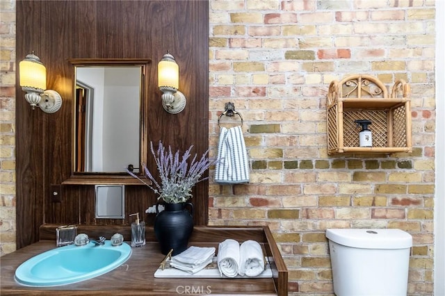 bathroom with a sink and toilet